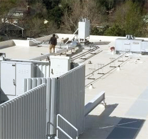 Commercial flat roof with rooftop equipment