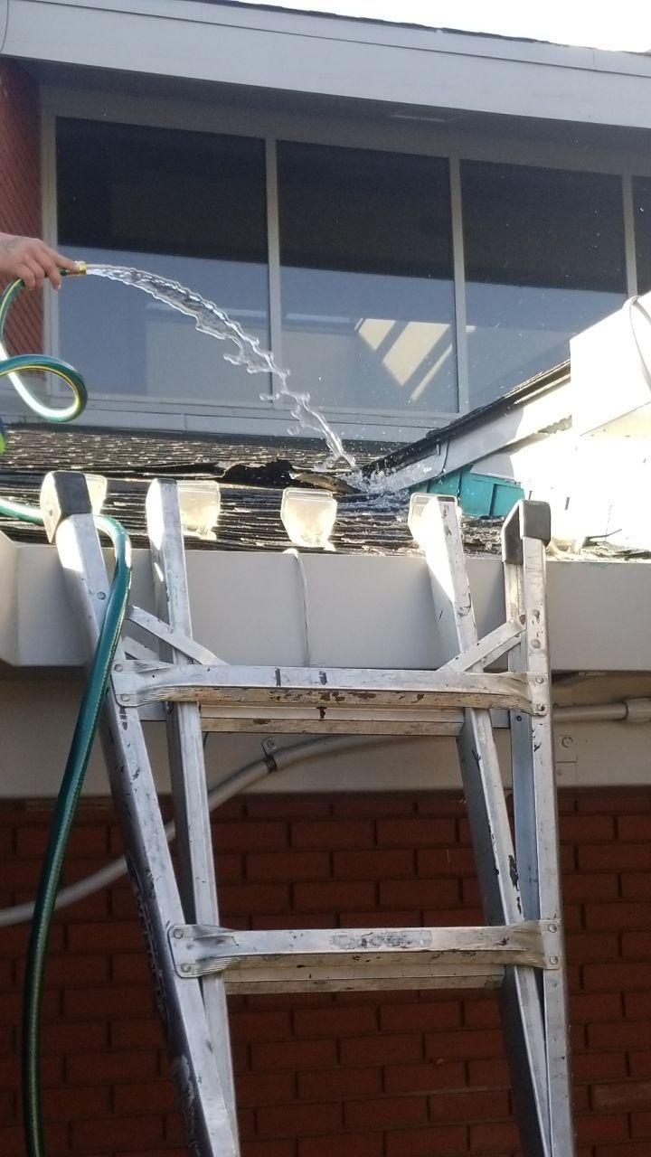 Water test to locate a roof leak